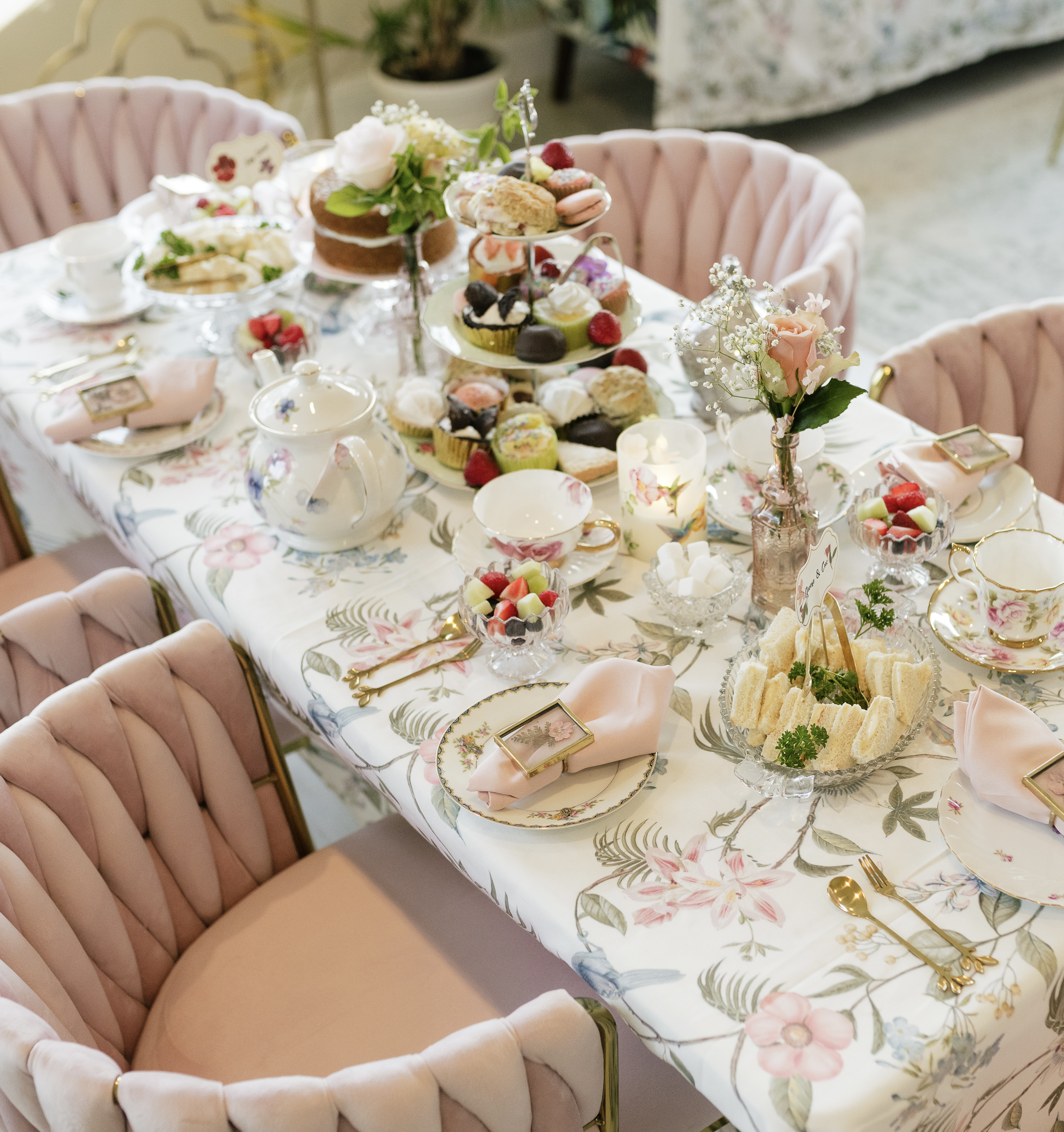 Styled service event table with flowers and place settings
